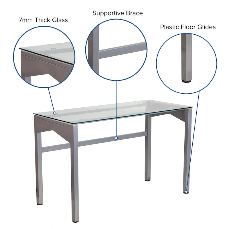 Bureau contemporain en verre trempé transparent avec pieds géométriques et cadre argenté