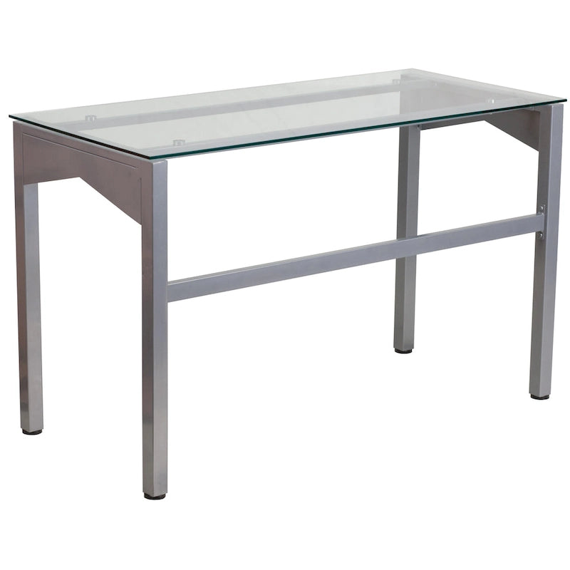 Bureau contemporain en verre trempé transparent avec pieds géométriques et cadre argenté